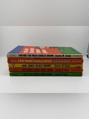 Charlie Brown Paperback Book Set - Colorful Spines (Green, Yellow, Orange, Blue)